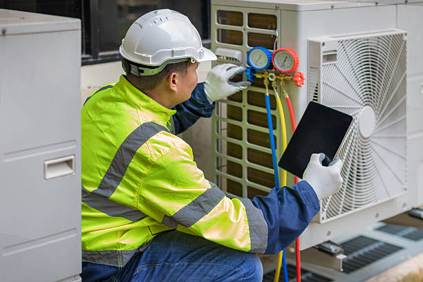 Professional Hvac technician working in Dale, IN